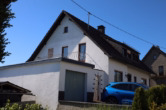 Giebelseite - Geräumiges 2-Familienhaus in wunderschöner Lage mit Garten, Doppelgarage und Fernsicht, Schüller 11