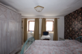 Schlafzimmer - ** GERESERVEERD **Mooie rustieke Eifelboerderij met stal, schuur en prachtige tuin, rustig gelegen te Wallenborn (8)