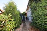 Rückseite - Gepflegtes Einfamilienhaus mit weiterem Baugrundstück, Garage und Garten Schmidtheim (12)
