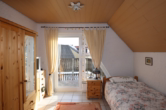 Schlafzimmer II - Schnuckeliges Einfamilienhaus mit kleinem pflegeleichten Grundstück und Garage, Bongard (5)