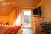 Schlafzimmer I - Schnuckeliges Einfamilienhaus mit kleinem pflegeleichten Grundstück und Garage, Bongard (5)