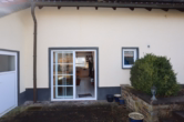 Terrassenausgang - Schnuckeliges Einfamilienhaus mit kleinem pflegeleichten Grundstück und Garage, Bongard (5)