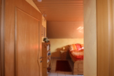 Schlafzimmer I - Schnuckeliges Einfamilienhaus mit kleinem pflegeleichten Grundstück und Garage, Bongard (5)