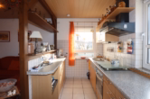 Küchenbereich - Schnuckeliges Einfamilienhaus mit kleinem pflegeleichten Grundstück und Garage, Bongard (5)