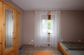 Schlafzimmer - Gemütliches und renoviertes Einfamilienhaus mit Anbau, Garagen und großem Garten, Boxberg