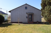 Ostansicht - ***Verkauft***Kleines Einfamilienhaus mit toller Aussicht, Garage und Garten in Dorfrandlage von Steineberg