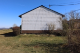 Westansicht - ***Verkauft***Kleines Einfamilienhaus mit toller Aussicht, Garage und Garten in Dorfrandlage von Steineberg