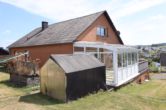 Giebelseite links - Einfamilienhaus mit Garage, Wintergarten schöner Aussicht und Garten, Oberbettingen (30)